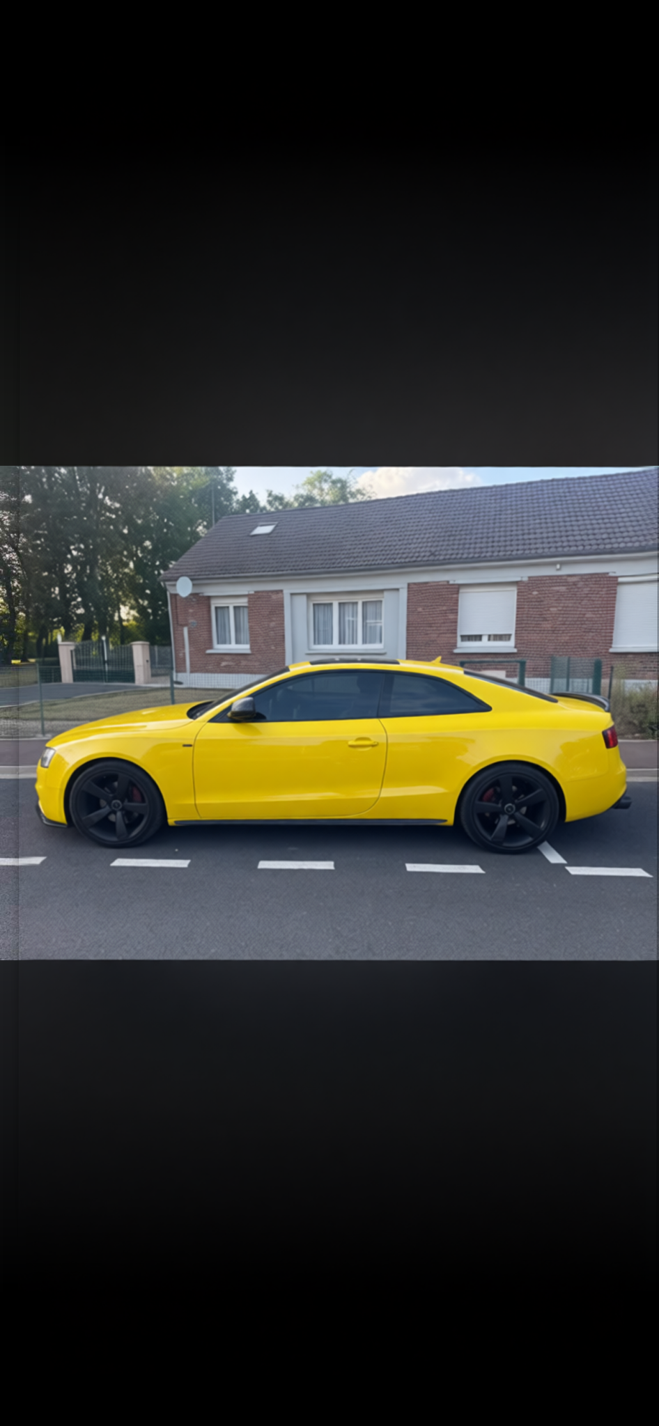 Car rendered in Racing Yellow gloss paint